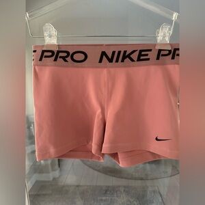 Nike Pro Dusty Pink Athletic Shorts with Black Swoosh